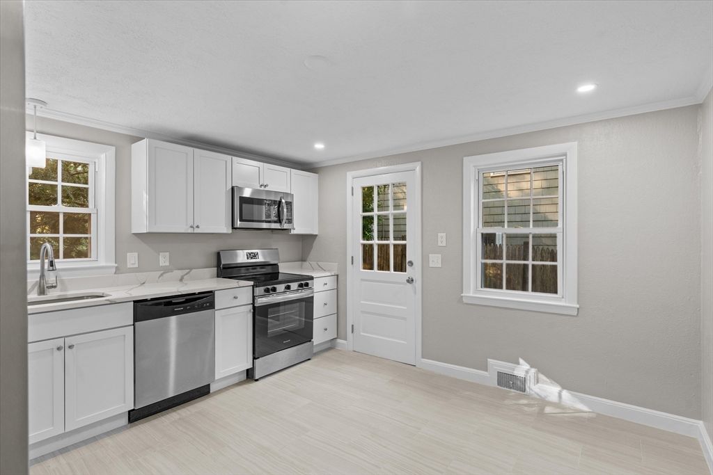 Interior, Kitchen, Recessed Lighting, Stainless Steel Appliances, Wood Texture Flooring