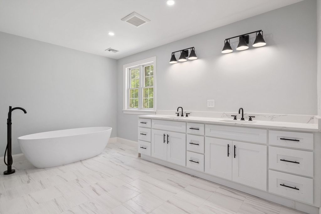 Bathroom, Dual Sink Vanities, Free Standing Baths, Interior, Marble, Recessed Lighting