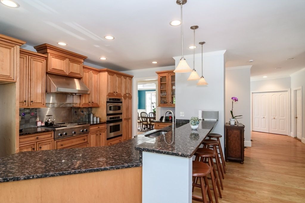 Dining room, Interior, Kitchen, Pendant Lights, Recessed Lighting, Stainless Steel Appliances, Wood Texture Flooring