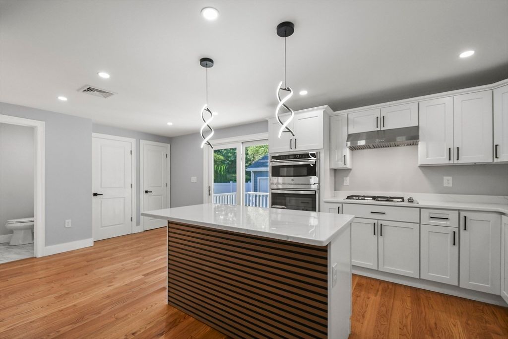 Interior, Kitchen, Pendant Lights, Recessed Lighting, Stainless Steel Appliances, Wood Texture Flooring