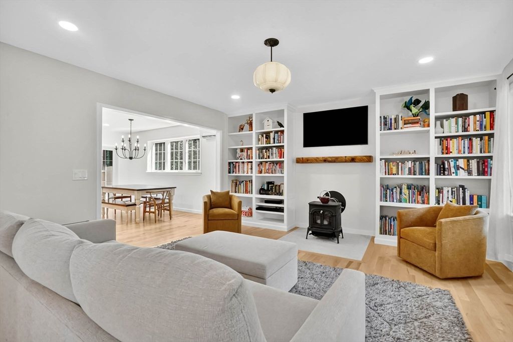 Dining room, Fireplace, Interior, Living room, Pendant Lights, Recessed Lighting, Wood Texture Flooring