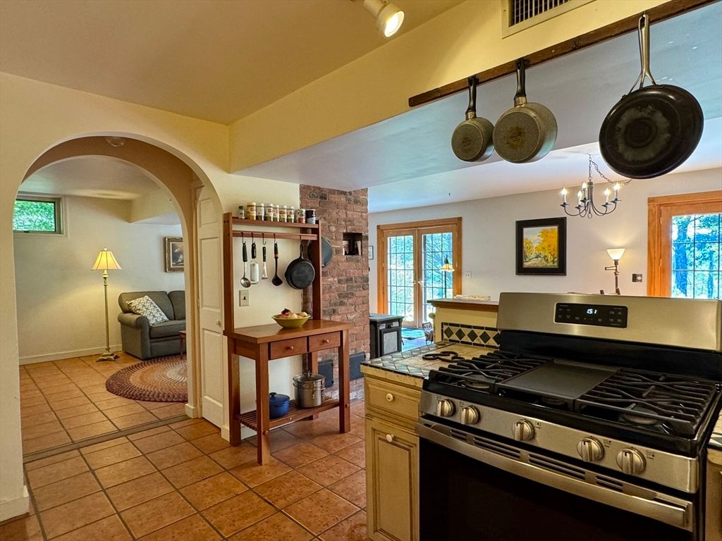 Interior, Kitchen, Pendant Lights, Stainless Steel Appliances, Stone Walls