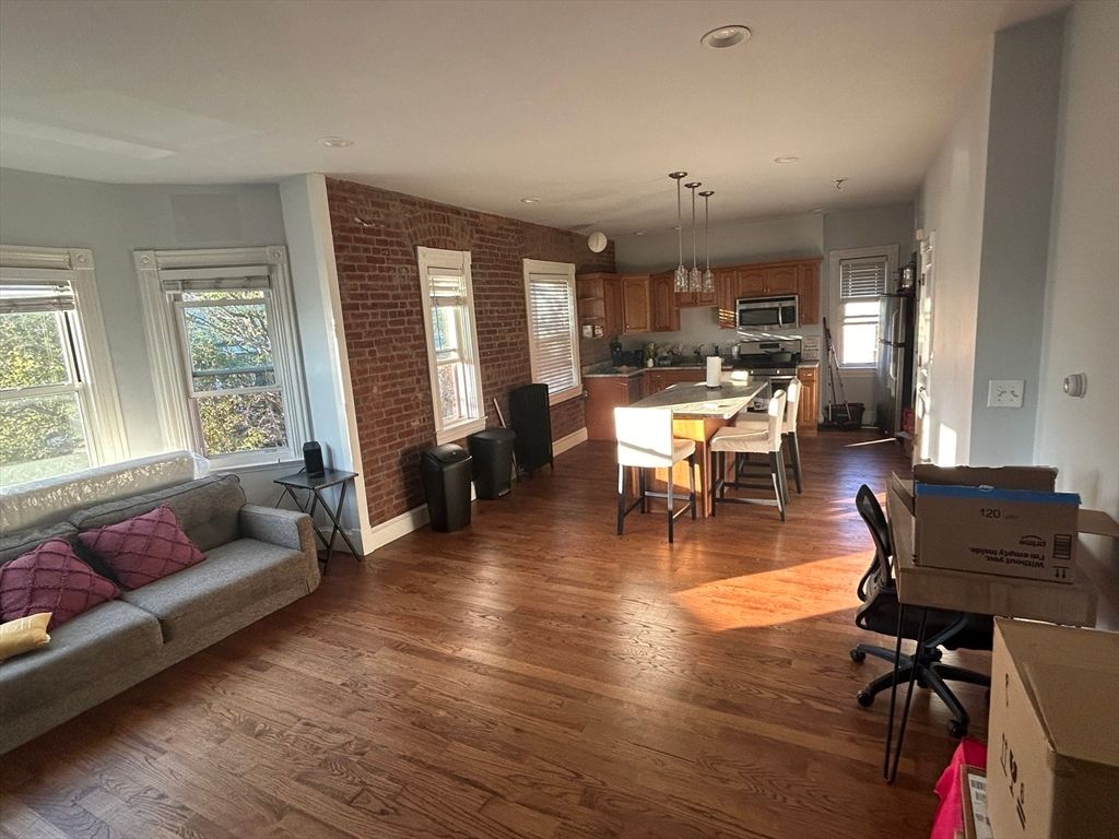 Home Office, Interior, Kitchen, Pendant Lights, Recessed Lighting, Stainless Steel Appliances, Stone Walls, Wood Texture Flooring