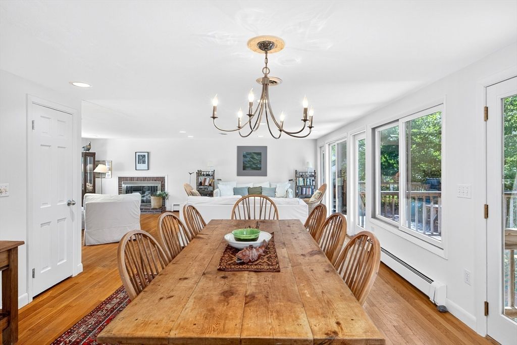 Chandelier, Dining room, Fireplace, Interior, Living room, Recessed Lighting, Wood Texture Flooring