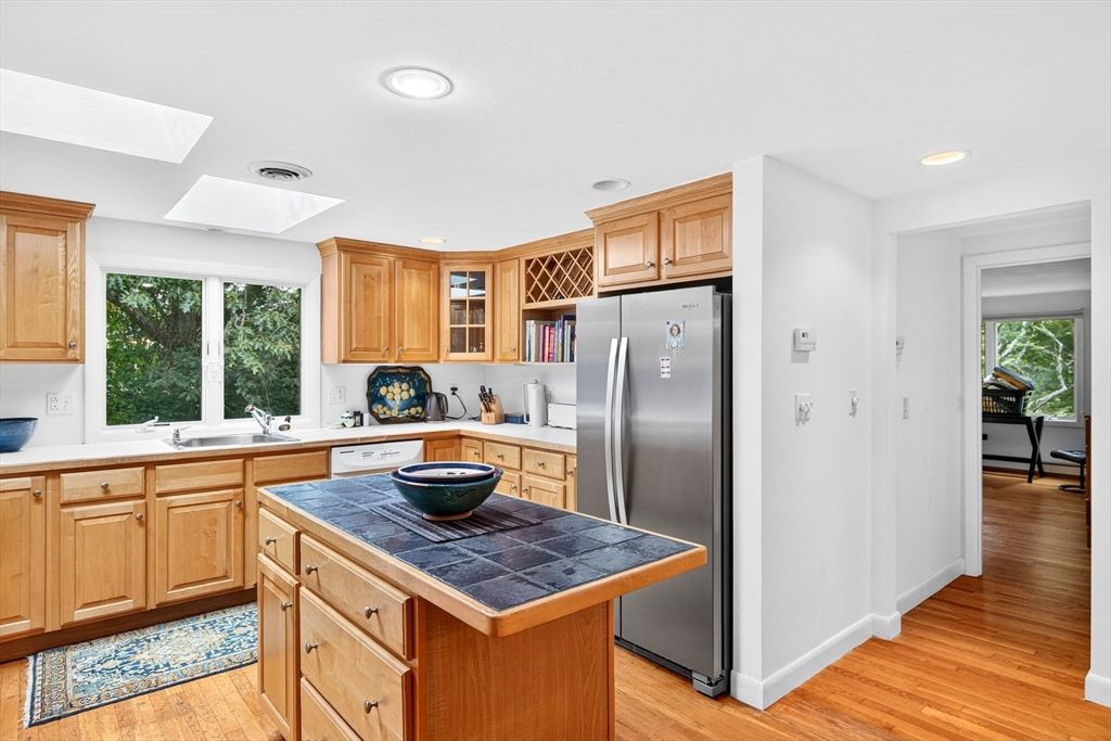 Interior, Kitchen, Recessed Lighting, Tile Countertops, Wood Texture Flooring