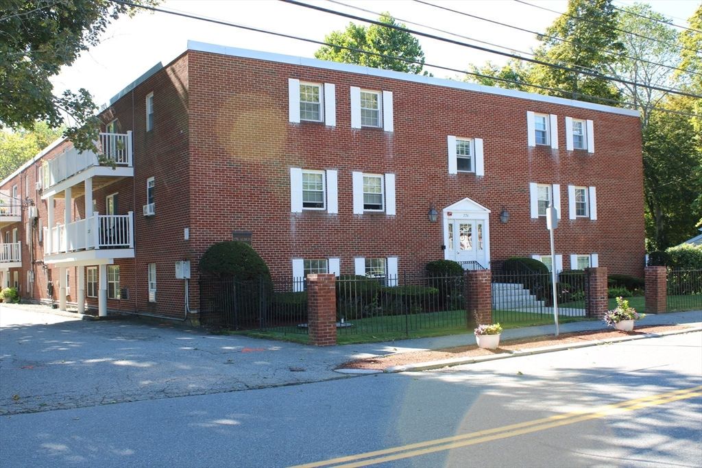 Exterior, Facade, Brick Facade, Condo Building
