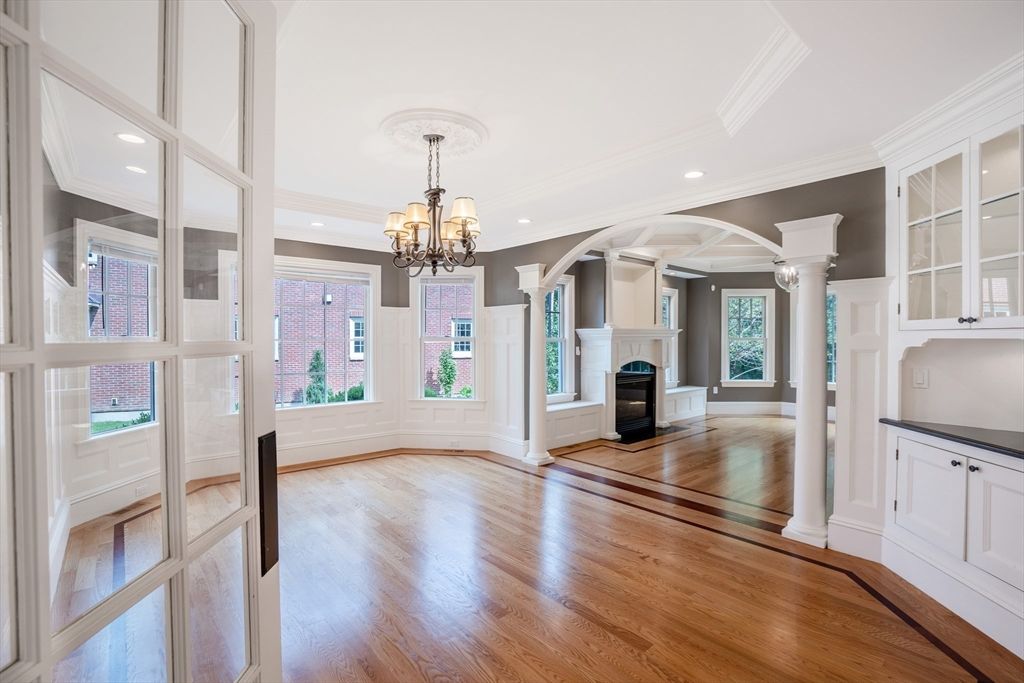 Chandelier, Empty room, Fireplace, Interior, Recessed Lighting, Wood Texture Flooring