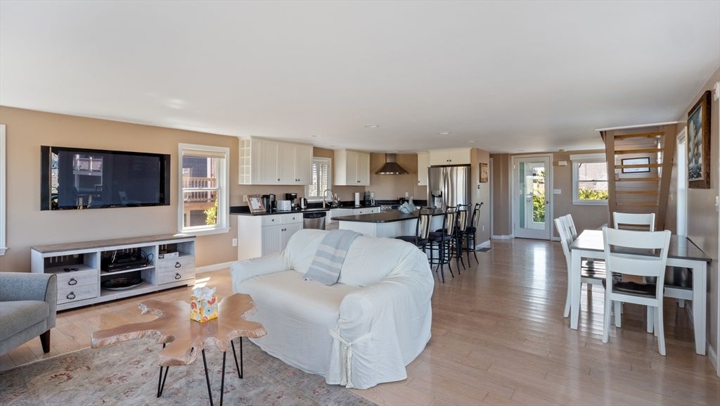 Dining room, Interior, Kitchen, Living room, Recessed Lighting, Stainless Steel Appliances, Wood Texture Flooring
