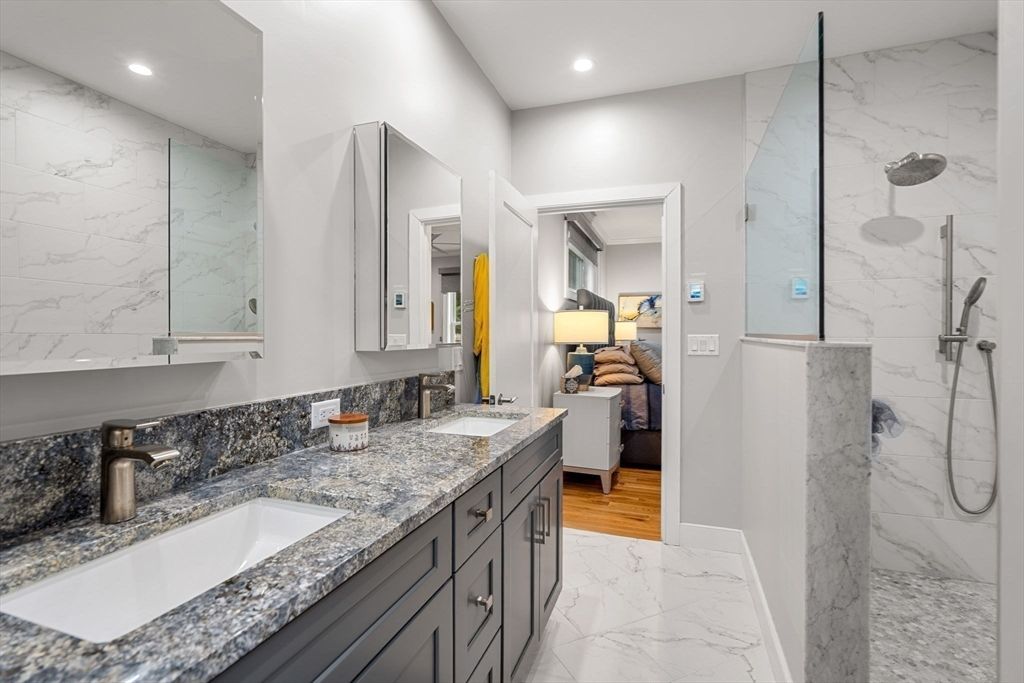 Bathroom, Dual Sink Vanities, Interior, Marble, Marble Walls, Recessed Lighting