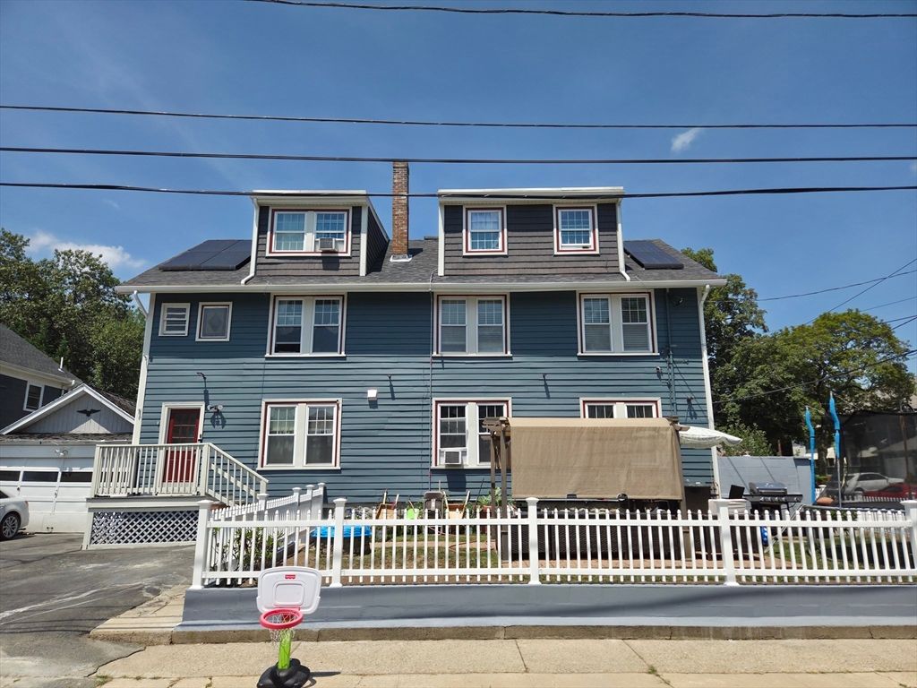 Exterior, Facade, Pool, Solar Panels, American Foursquare