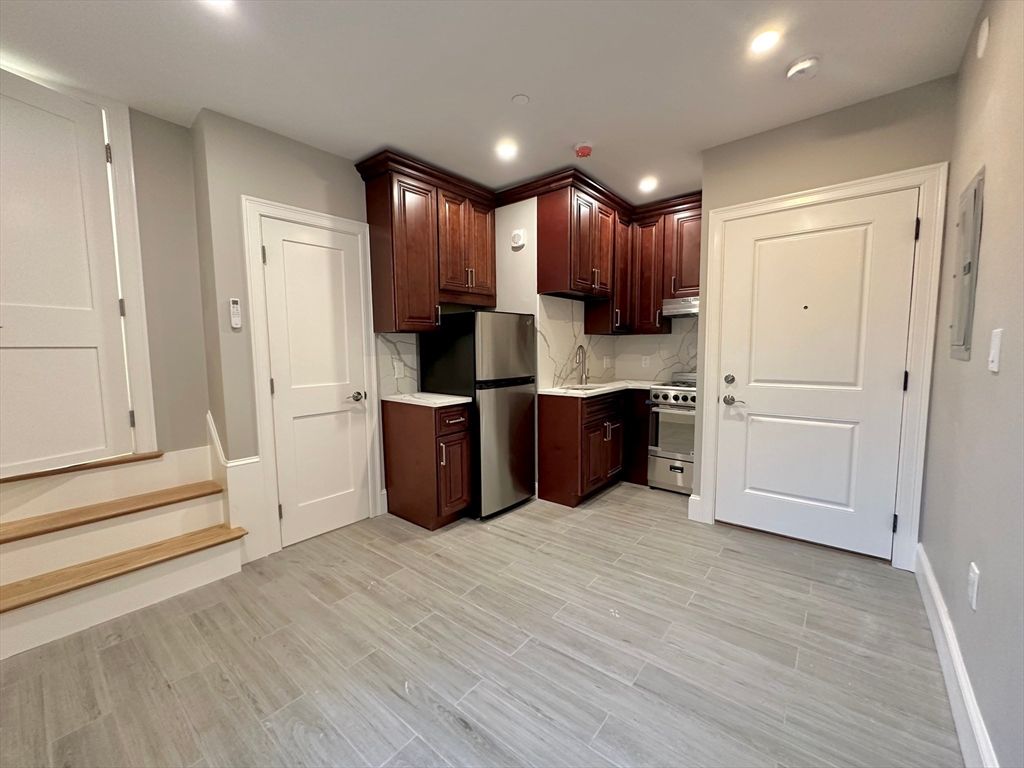 Interior, Kitchen, Marble Walls, Recessed Lighting, Wood Texture Flooring