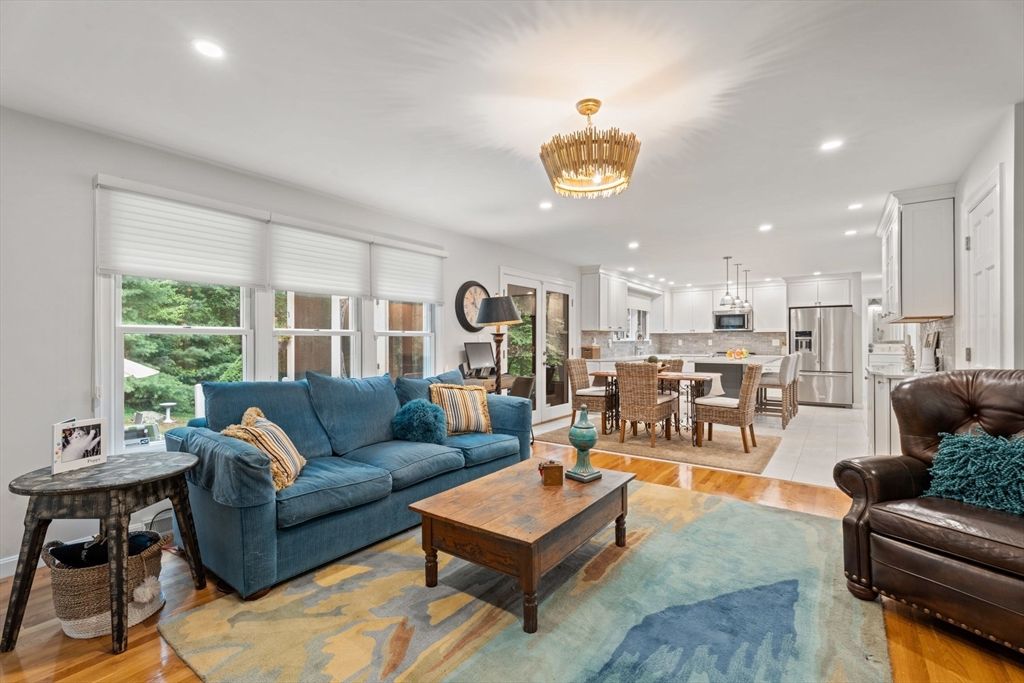 Chandelier, Dining room, Interior, Kitchen, Living room, Pendant Lights, Recessed Lighting, Stainless Steel Appliances, Wood Texture Flooring