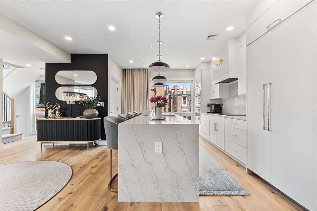Dining room, Interior, Kitchen, Pendant Lights, Recessed Lighting, Stainless Steel Appliances, Wood Texture Flooring