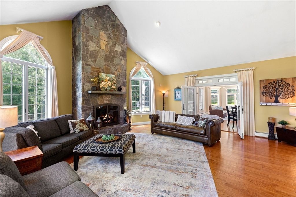 Fireplace, Interior, Living room, Recessed Lighting, Stone Walls, Wood Texture Flooring