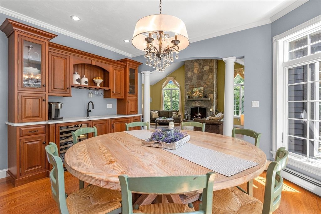 Chandelier, Dining room, Fireplace, Interior, Kitchen, Recessed Lighting, Wood Texture Flooring