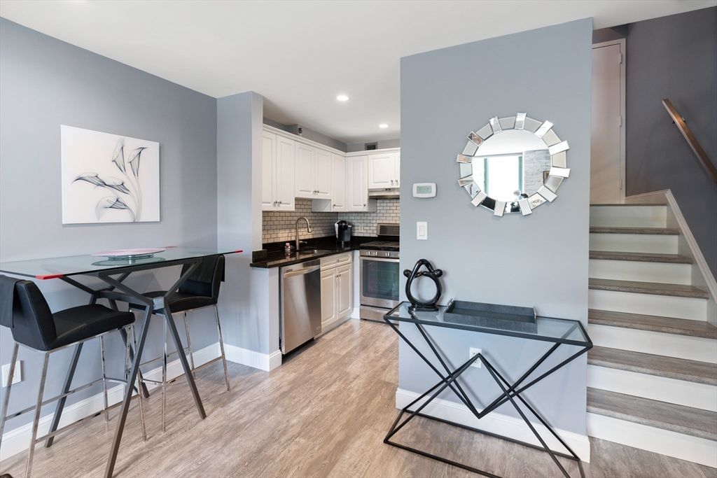Dining room, Interior, Kitchen, Recessed Lighting, Stainless Steel Appliances, Wood Texture Flooring