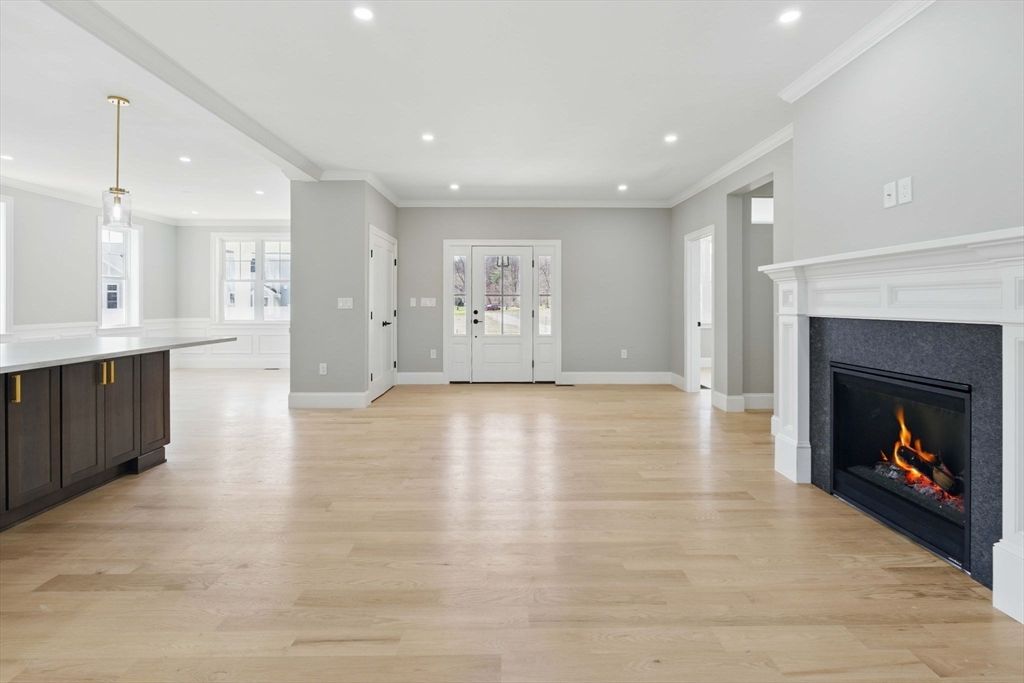 Empty room, Fireplace, Interior, Kitchen, Pendant Lights, Recessed Lighting, Wood Texture Flooring