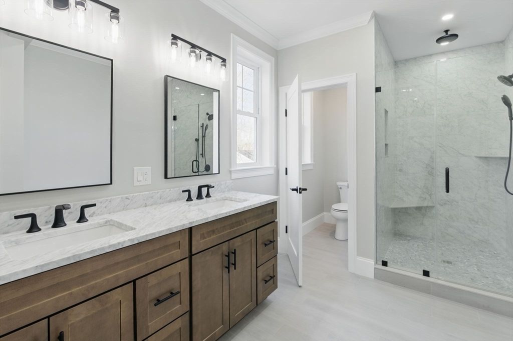 Bathroom, Dual Sink Vanities, Glass Shower, Interior, Marble Walls, Recessed Lighting
