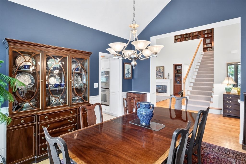 Chandelier, Dining room, Fireplace, Interior, Pendant Lights, Wood Texture Flooring