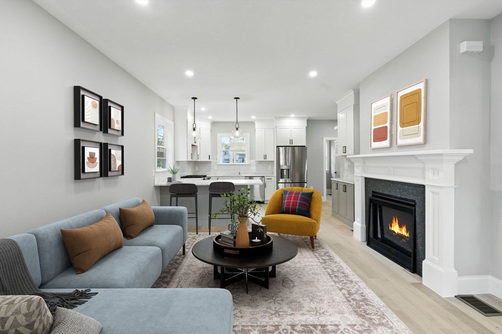 Fireplace, Interior, Kitchen, Living room, Pendant Lights, Recessed Lighting, Stainless Steel Appliances, Wood Texture Flooring