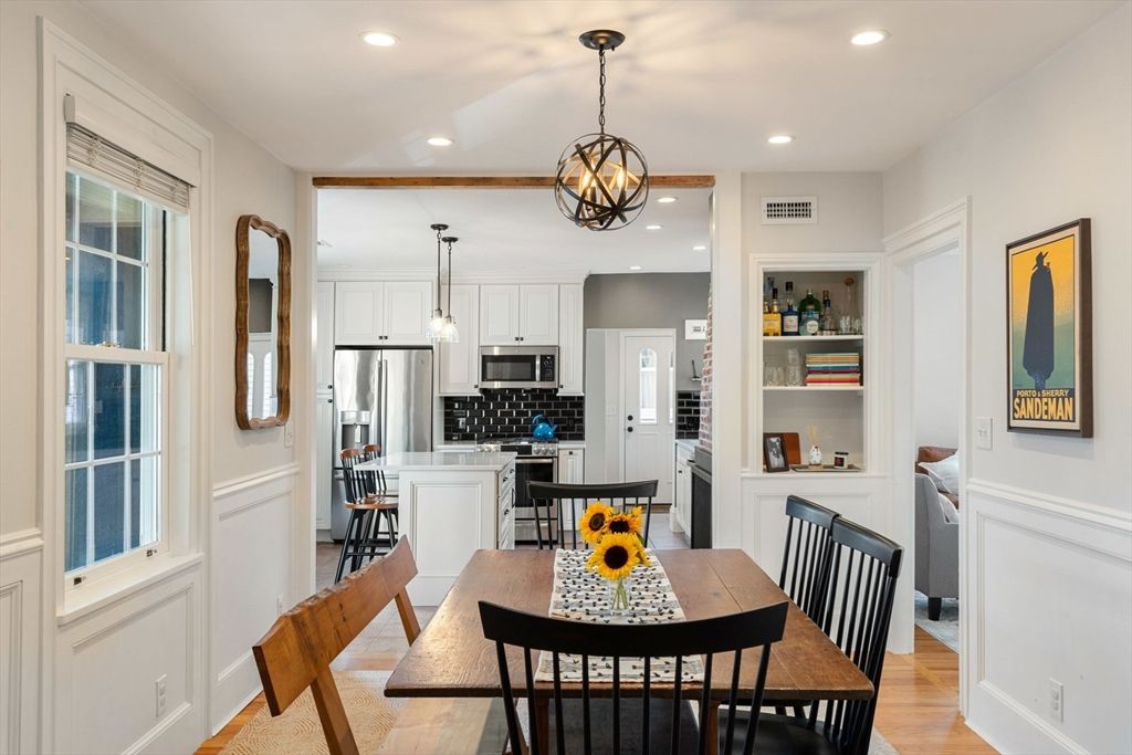 Chandelier, Dining room, Interior, Kitchen, Pendant Lights, Recessed Lighting, Stainless Steel Appliances, Wood Texture Flooring