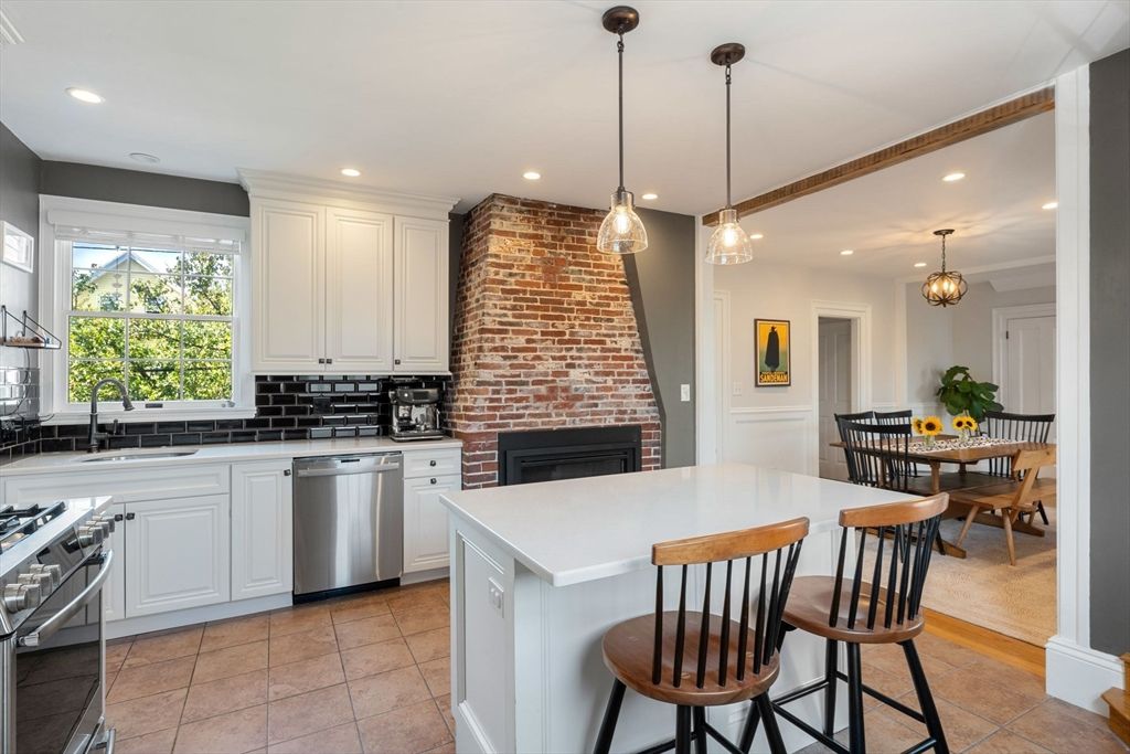 Dining room, Fireplace, Interior, Kitchen, Pendant Lights, Recessed Lighting, Stainless Steel Appliances, Stone Walls