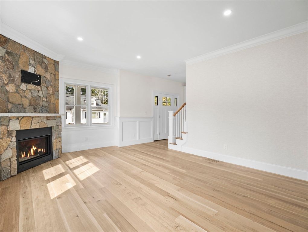 Empty room, Fireplace, Interior, Recessed Lighting, Stone Walls, Wood Texture Flooring