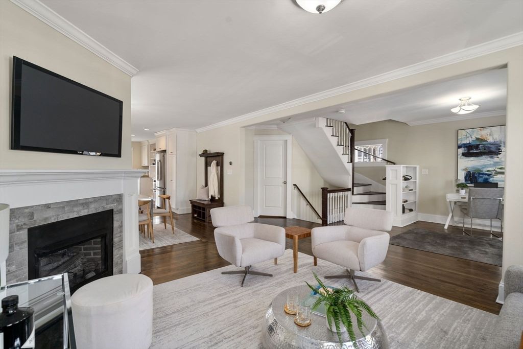Dining room, Fireplace, Interior, Living room, Recessed Lighting, Wood Texture Flooring