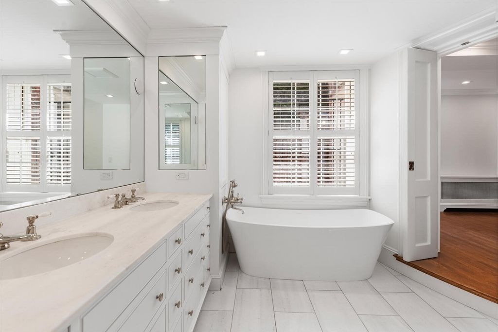 Bathroom, Dual Sink Vanities, Free Standing Baths, Interior, Marble, Recessed Lighting, Wood Texture Flooring