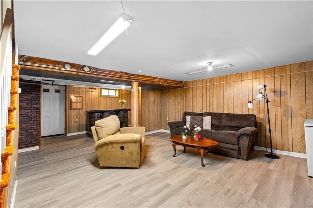 Fireplace, Interior, Living room, Recessed Lighting, Wood Texture Flooring, Wooden Walls