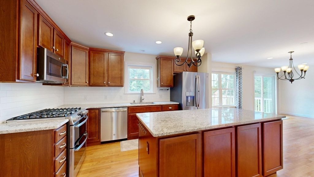 Chandelier, Interior, Kitchen, Pendant Lights, Recessed Lighting, Stainless Steel Appliances, Wood Texture Flooring