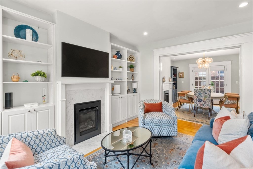 Dining room, Fireplace, Interior, Living room, Pendant Lights, Recessed Lighting, Wood Texture Flooring