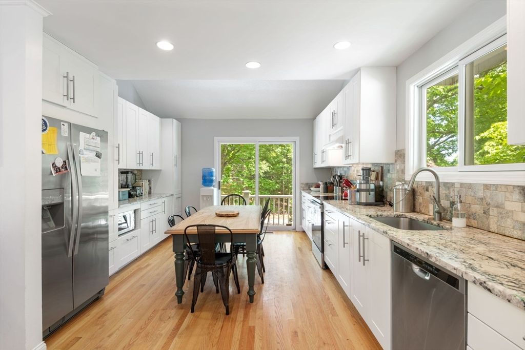 Dining room, Interior, Kitchen, Recessed Lighting, Stainless Steel Appliances, Wood Texture Flooring