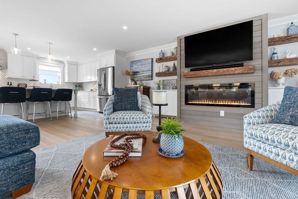 Fireplace, Interior, Kitchen, Living room, Pendant Lights, Recessed Lighting, Stainless Steel Appliances, Wood Texture Flooring