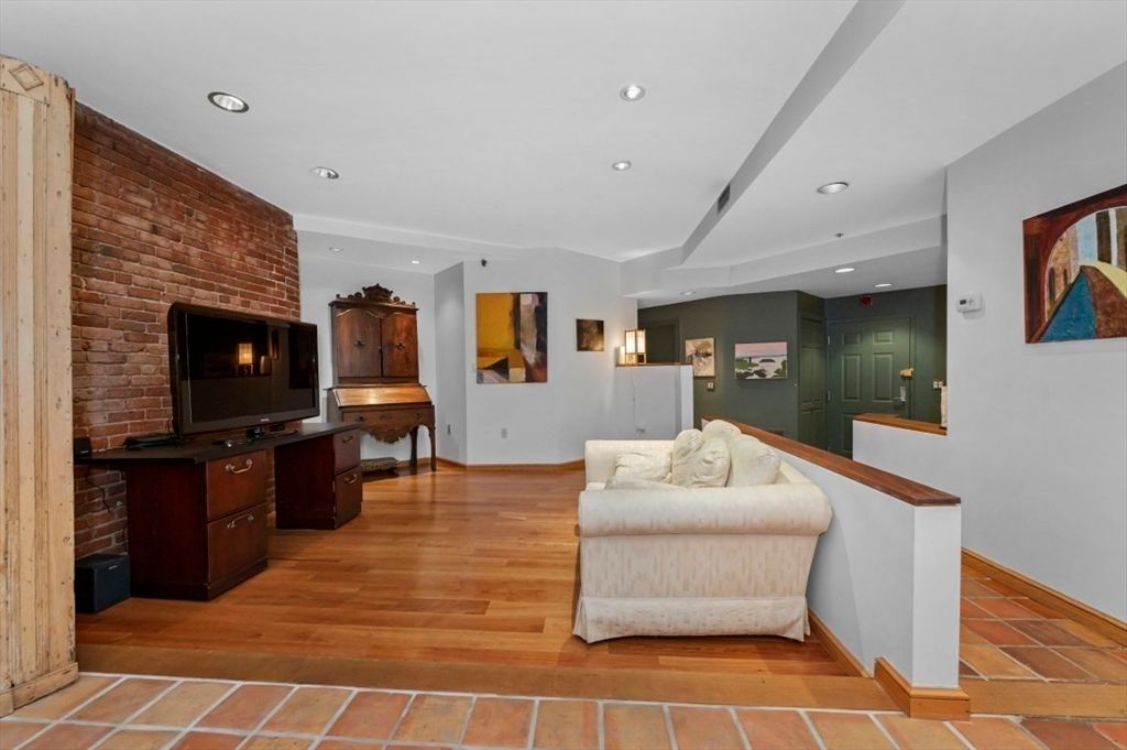 Fireplace, Interior, Piano, Recessed Lighting, Stone Walls, Wood Texture Flooring