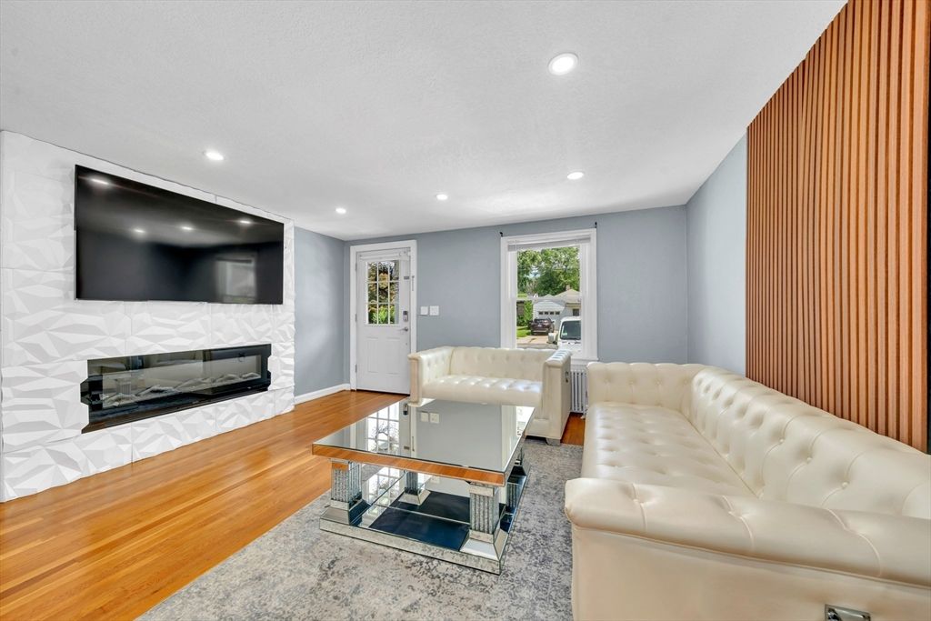 Fireplace, Interior, Living room, Recessed Lighting, Wood Texture Flooring
