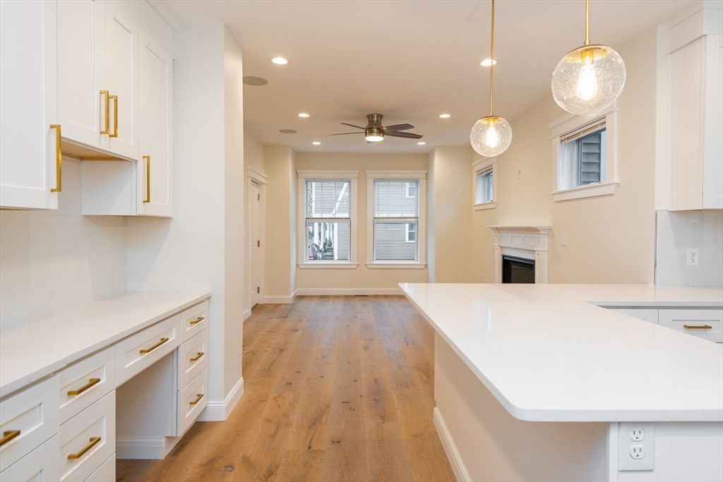Fireplace, Interior, Pendant Lights, Recessed Lighting, Wood Texture Flooring