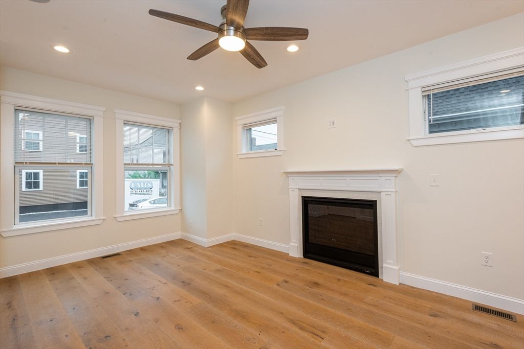 Empty room, Fireplace, Interior, Recessed Lighting, Wood Texture Flooring
