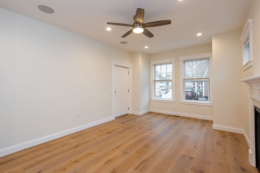 Empty room, Fireplace, Interior, Recessed Lighting, Wood Texture Flooring