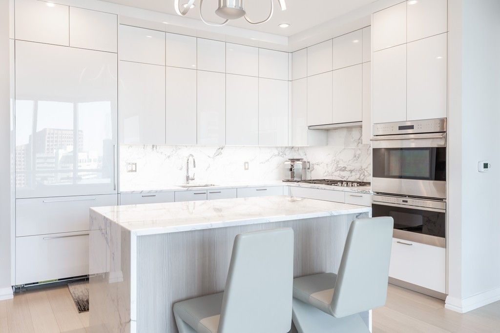 Interior, Kitchen, Marble Walls, Recessed Lighting, Stainless Steel Appliances, Wood Texture Flooring