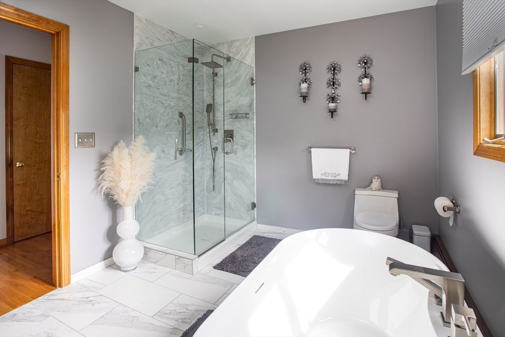 Bathroom, Free Standing Baths, Glass Shower, Interior, Marble, Marble Walls, Wood Texture Flooring