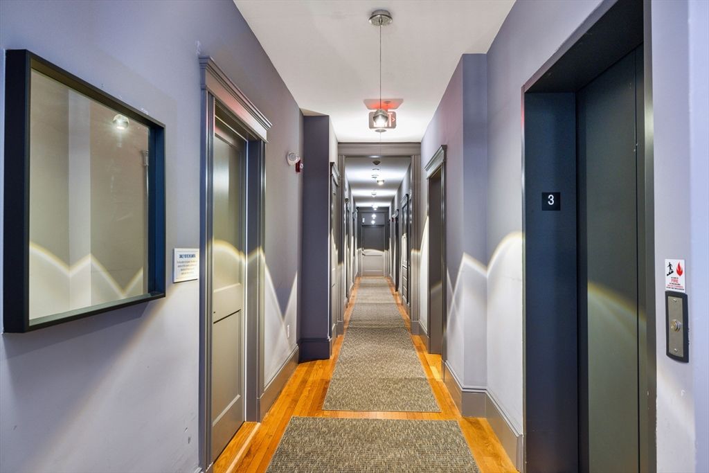 Elevator, Interior, Pendant Lights, Wood Texture Flooring