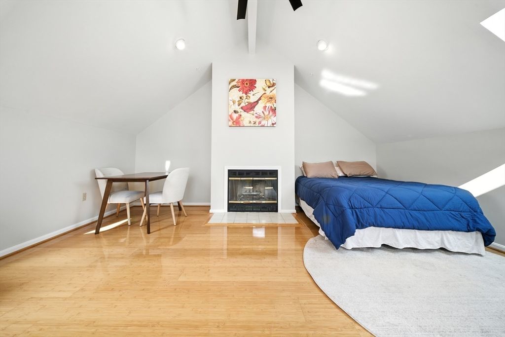 Bedroom, Fireplace, Interior, Recessed Lighting, Wood Texture Flooring