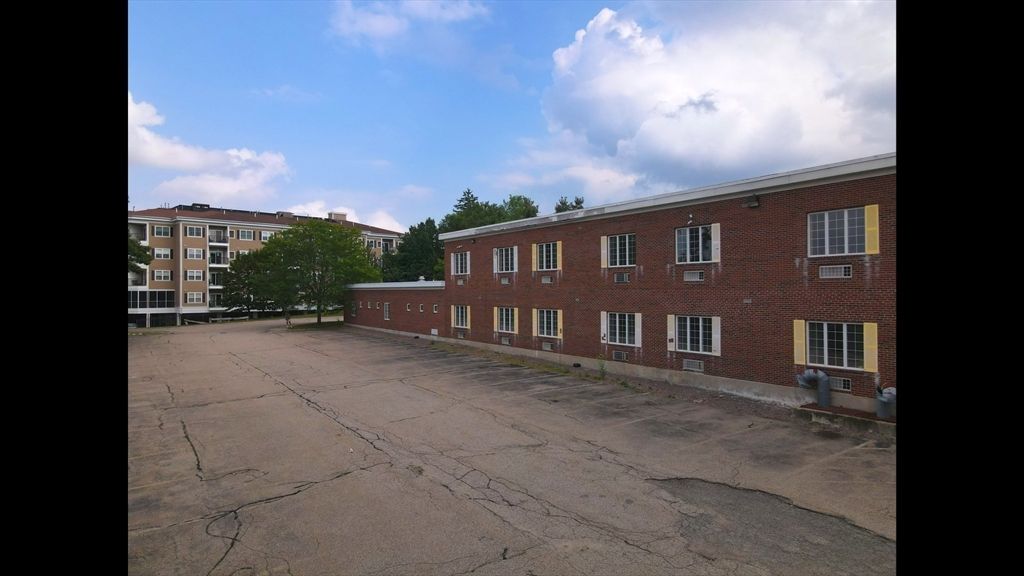 Exterior, Facade, Brick Facade, Condo Building