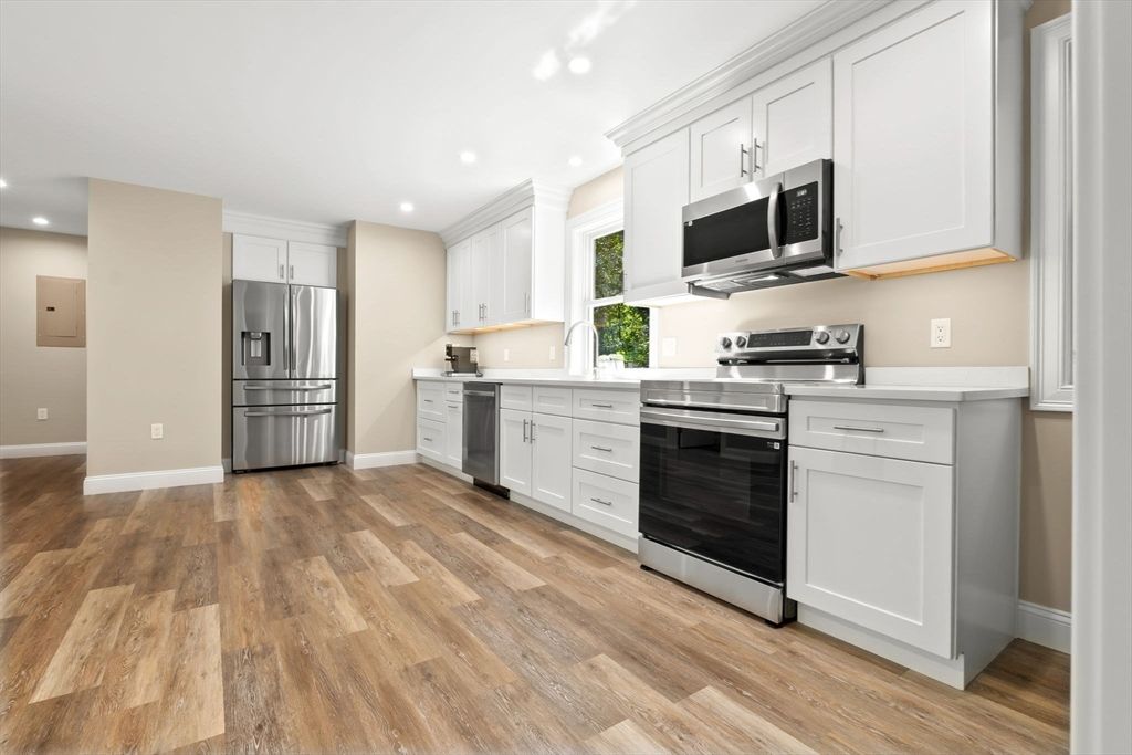 Interior, Kitchen, Recessed Lighting, Stainless Steel Appliances, Wood Texture Flooring
