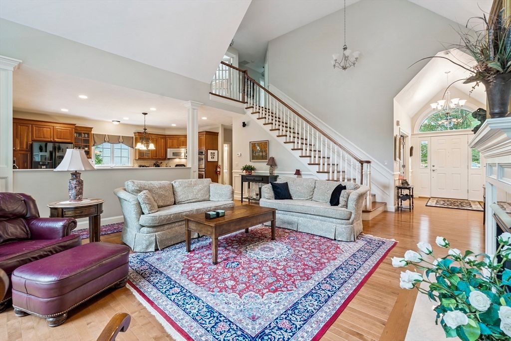 Chandelier, Interior, Kitchen, Living room, Pendant Lights, Recessed Lighting, Stainless Steel Appliances, Wood Texture Flooring