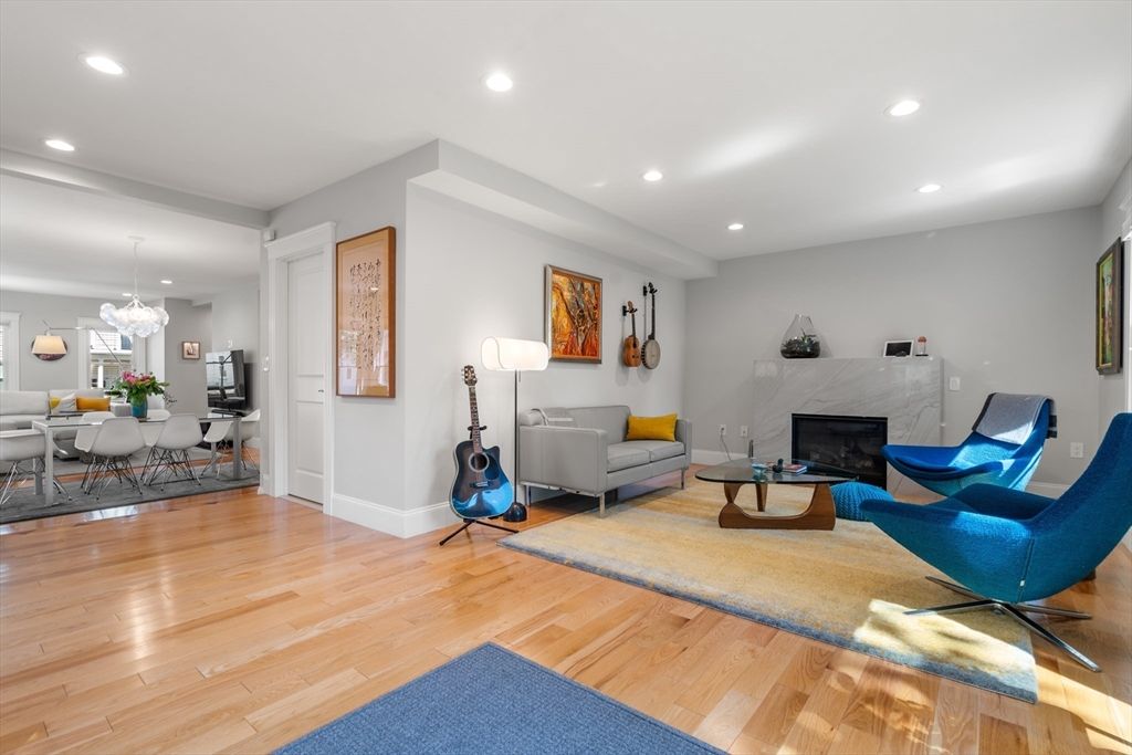 Dining room, Fireplace, Interior, Living room, Pendant Lights, Recessed Lighting, Wood Texture Flooring