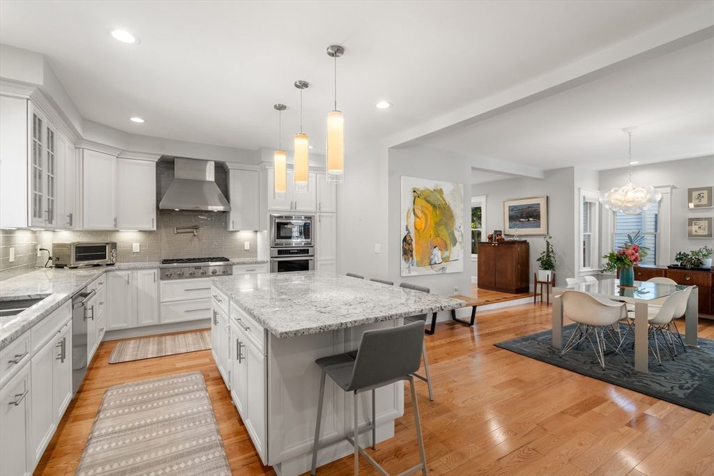 Chandelier, Dining room, Interior, Kitchen, Pendant Lights, Recessed Lighting, Stainless Steel Appliances, Wood Texture Flooring