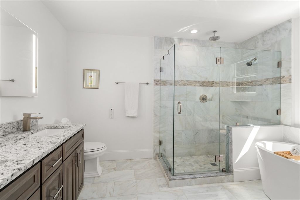 Bathroom, Free Standing Baths, Glass Shower, Interior, Marble, Marble Walls, Recessed Lighting