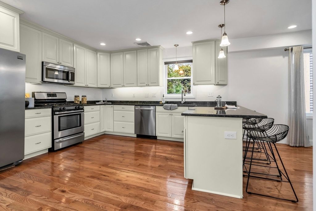 Interior, Kitchen, Pendant Lights, Recessed Lighting, Stainless Steel Appliances, Wood Texture Flooring